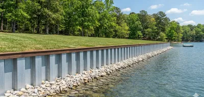Newly constructed steel seawall along lakefront property